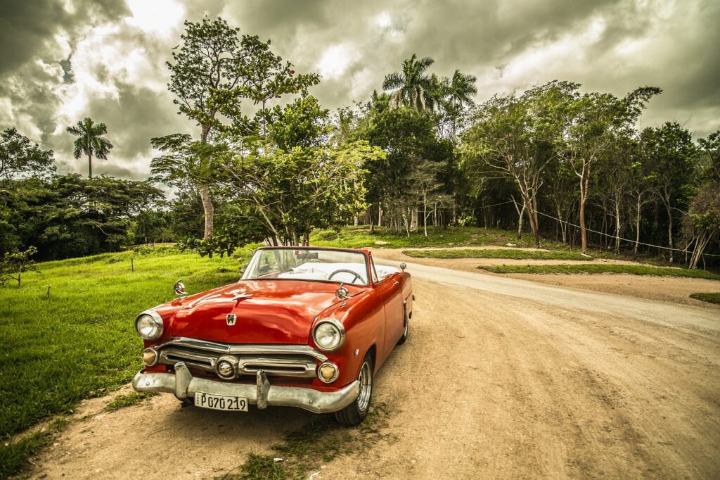 classic car on dirt road, florida auto insurance